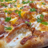 Chicken Bacon Ranch Pizza · chicken cutlet, bacon, cheddar & mozzarella blend, chopped scallions, hidden valley ranch