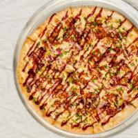 James Dean Pizza · BBQ chicken, scallion, red onions, pepper jack cheese, mozzarella cheese and topped with chi...