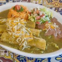 Enchiladas Verdes · Chicken or beef. Smothered in a tomatillo sauce with cheese on top. Served with rice and bea...