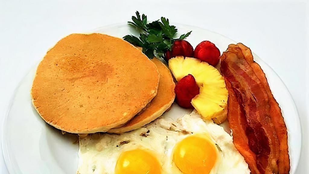 Chi Breakfast Deluxe · Choice of pancakes or French toast with two eggs and choice of bacon, sausage, ham or scrapple.