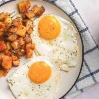 2 Eggs Breakfast · Served with homefries, toast and jelly.