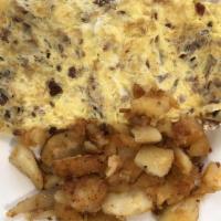 Bacon Omelette Breakfast · Made with three large fresh eggs. Served with homefries.