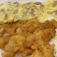 Ham Omelette Breakfast · Made with three large fresh eggs. Served with homefries.