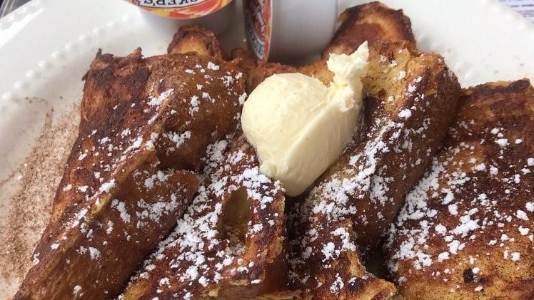 Short Stack Of French Toast Breakfast · Topped with powder sugar.
