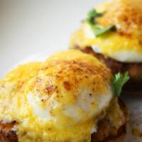 Crab Benedict Breakfast · Two poached eggs on top of our world famous jumbo lump cake and toasted English muffin, then...