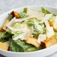 Caesar · romaine, shaved parmesan, cracked pepper, house-made croutons, Caesar dressing.