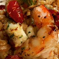 Gamberi Con Farro · Sautéed shrimp served on top of a bed of farro with roasted cherry tomatoes