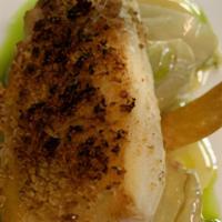 Halibut Con Finocchio · Pan seared Halibut on a bed of roasted fennel in a white wine sauce