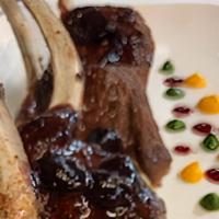 Agnello Alla Sena · Herbs and breadcrumb encrusted lamb chops with a dried cherry port sauce