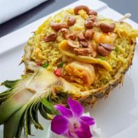 Pineapple Fried Rice · Chicken and shrimp with pineapple, peppers, eggs with cashew nut.