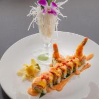 Hawaii Roll · Tempura shrimp avocado inside, topped with spicy tuna, fresh mango, with chef's special sauc...