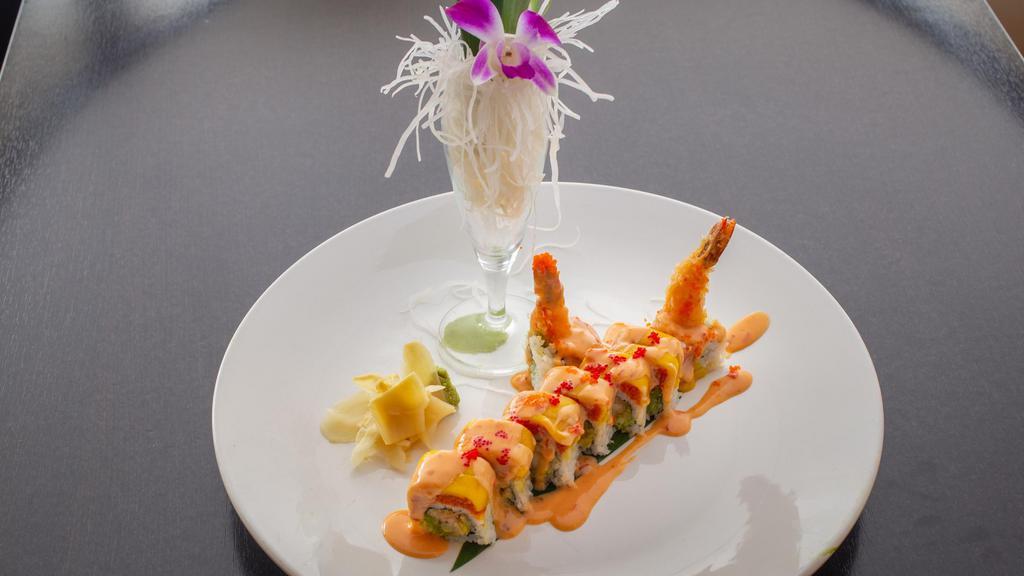 Hawaii Roll · Tempura shrimp avocado inside, topped with spicy tuna, fresh mango, with chef's special sauce. Raw.