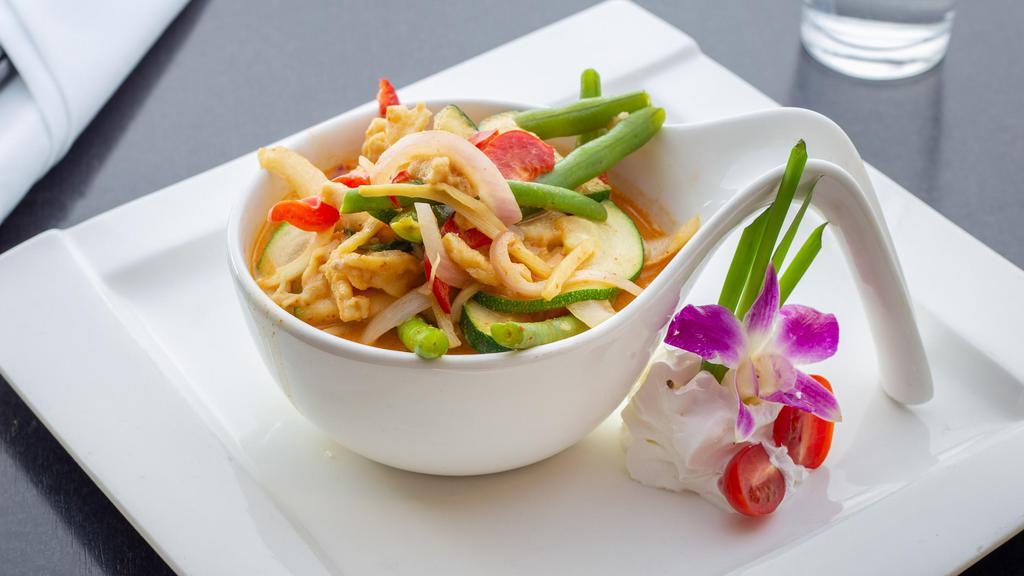 Red Curry · Zucchini, peppers, onion, bamboo strip, string bean and basil in red curry coconut. Spicy.