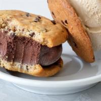 Chocolate Ice Cream Cookie Sandwich · home made chocolate chip cookies filled with chocolate ice cream.

All natural. vegan.
conta...