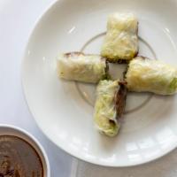 Grilled Pork Spring Rolls (2) · Spring rolls are light and refreshing served cool to the touch.  Grilled pork,  mint, lettuc...