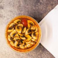 Tom Yum Soup · Spicy. Sweet and sour soup with mushrooms, tomatoes, scallions, and cilantro.