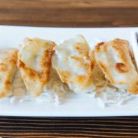 Japanese Gyoza (5 Pieces) · Served pan-fried, drizzled with a light chili sauce.