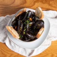 Mussels Al Chipotle · Mussels sautéed in a smokey chipotle adobo sauce.