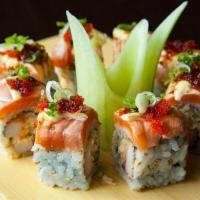 Phoenix Roll · Spicy. Seared salmon, kani, tobiko, spicy mayo, and kabayaki.