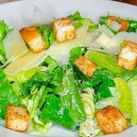 Caesar Salad · Tossed in house made dressing, Pecorino Romano cheese & croutons