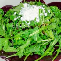 Beet Salad · Fresh roasted beets, with goat cheese over baby arugula with balsamic reduction drizzle