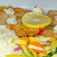 Chicken Francese · Egg battered, topped with jumbo lump crabmeat, in a lemon butter white wine sauce with risot...