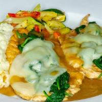 Veal Francese · Egg battered, topped with jumbo lump crabmeat, in a lemon butter white wine sauce with risot...