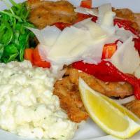 Veal Milanese · Breaded pan seared with roasted peppers & tomatoes served with creamy risotto & baby arugula