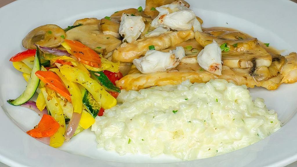 Veal Tre Famiglia · Sautéed with mushrooms, in a Marsala cream sauce with jumbo lump crabmeat with risotto and sauteed vegetables