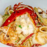 Pesce Primavera · Baby Maine lobster, scallops, shrimp, artichoke, sundried tomato, & roasted peppers, aglio e...