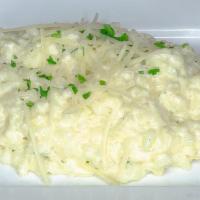 Side Risotto · Our house made specialty, creamy with a blend of cheeses