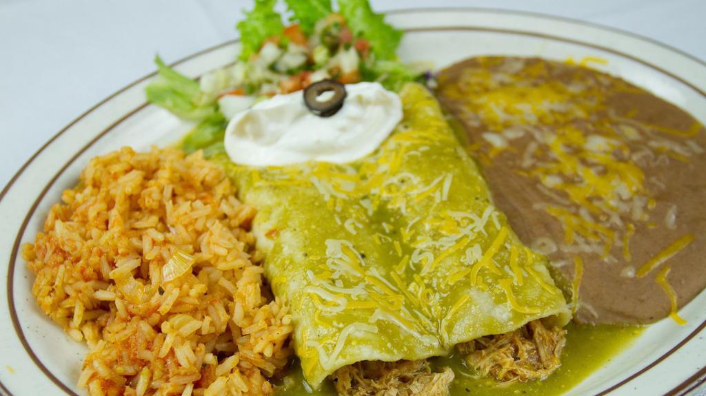 #25 · 2 Green Enchiladas  choice of beef or chicken, cheese and our special recipe, gravy style green sauce made with tomatillos, a small green Mexican tomato. Served with sour cream.