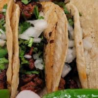Traditional Mexican Taco · Prepared on corn tortilla, protein of your choice, cilantro, onion, jalapeno and radish.. gr...