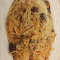 Spaghetti Malafemmena Dinner · Chef Testa's original creation. Crabmeat, fresh clams, capers and black olives sautéed in a ...