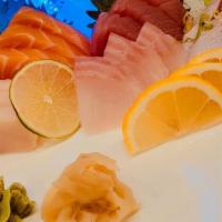 Sashimi Deluxe · Raw. 15 pieces of assorted sashimi.
