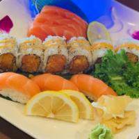 Salmon Lover · Raw. 3 pieces of salmon sushi, 3 pieces of salmon sashimi and spicy salmon roll.