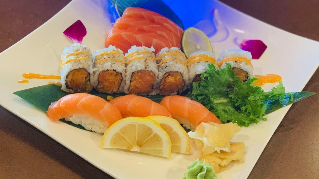 Salmon Lover · Raw. 3 pieces of salmon sushi, 3 pieces of salmon sashimi and spicy salmon roll.