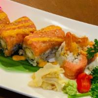 Patriot Roll · Raw. Shrimp tempura inside, topped with spicy tuna and crunch.