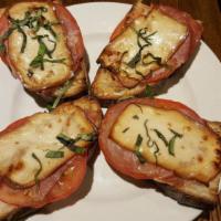 Grilled Country Bread, Smoked Mozzarella, Prosciutto Backyard Farms Tomato · Smoked mozzarella, prosciutto, and tomato.