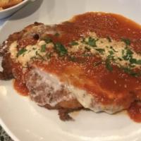 Chicken Parmigiana · Served with your choice of pasta.
