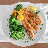 Broiled Salmon Steak · Served with drawn butter lemon and two vegetables.
