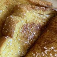 French Toast · Served with butter and maple syrup.