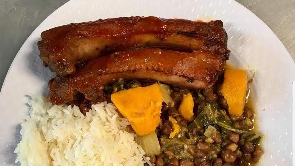Bbq Ribs · choice of two sides  rice, beans, macaroni & cheese, mashed potatoes,, or collard greens,. Comes with corn bread.