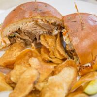 Carolina Bbq Pork · Housemade smoked BBQ pulled pork topped with WICH!T BBQ sauce, on a brioche roll.