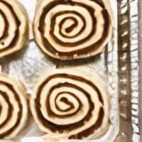 Bake-At-Home Cinnamon Rolls · 4 frozen cinnamon rolls, two sides of vanilla bean glaze