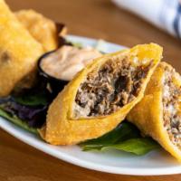 Philly Cheesesteak Egg Rolls · Chipotle aioli.
