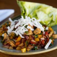 Asian Lettuce Wraps · Sautéed chicken, bell peppers, scallions, water chestnuts, ginger, Asian sauce.