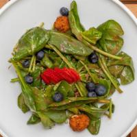Wild Berry Spinach · Wild berries, crunchy goat cheese croquettes, pecans, balsamic raspberry vinaigrette.