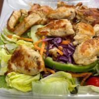 Chicken Kebab Salad · Grilled Chicken Served Over Garden Salad Served With Our Signature House Dressing