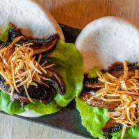 Shroom Buns · Steamed buns, portobello mushrooms, lettuce, scallions.